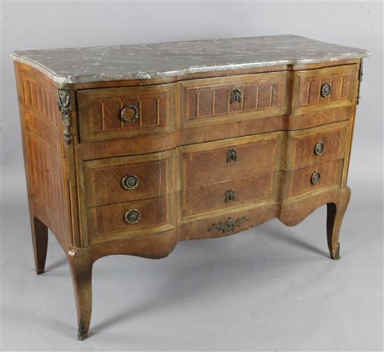 A late 19th century French parquetry serpentine commode, W.4ft 3in. D.1ft 11in. H.3ft 1in.